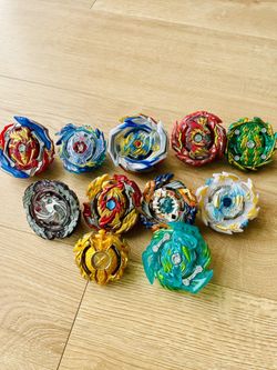 Rare Beyblades Including Extra Metal Wheels and Bottoms