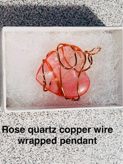 Rose quartz copper wrapped pendant