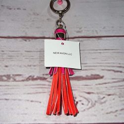 Avon Tassel purse, backpack, keychain, rear view mirror dangle accessory