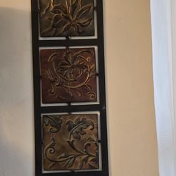 azulejo o panel de metal repujado