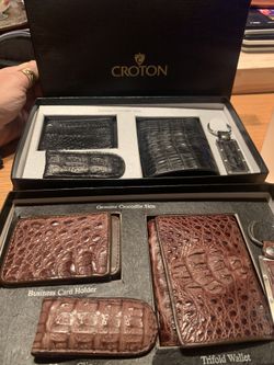 Genuine Crocodile gift sets including Trifold wallet, business card holder, keychain, and magneti money clip. These are brand new in the box. 1 Brown