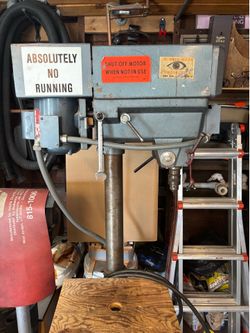 Drill press with stand