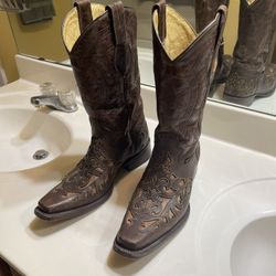 brown leather cowboy boots.