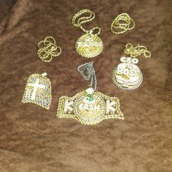 ANY PIECE WITH THE CHAIN $120.00 ..STAINLESS STEEL GOLD EVERYTHING WONT NEVER TURN OR FADE.. 