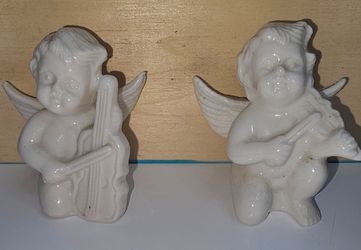 Vintage Glazed Ceramic Angels Playing Violin & Cello- Set Of 2. 
Great condition 
PRE-LOVED 
Pls see all pictures for details