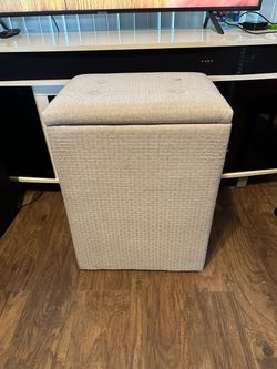 Fabric storage pouf for the living room