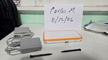 New Nintendo 2DS XL with over 120 games installed and a 256gb sd card