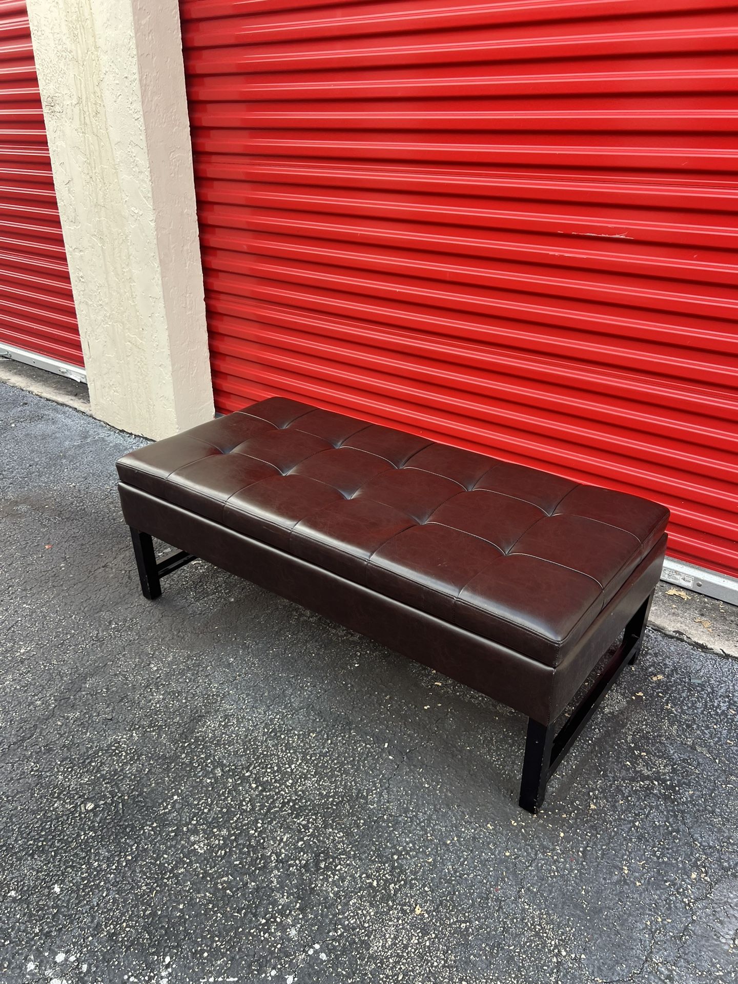 faux or bonded leather tufted storage ottoman bench.