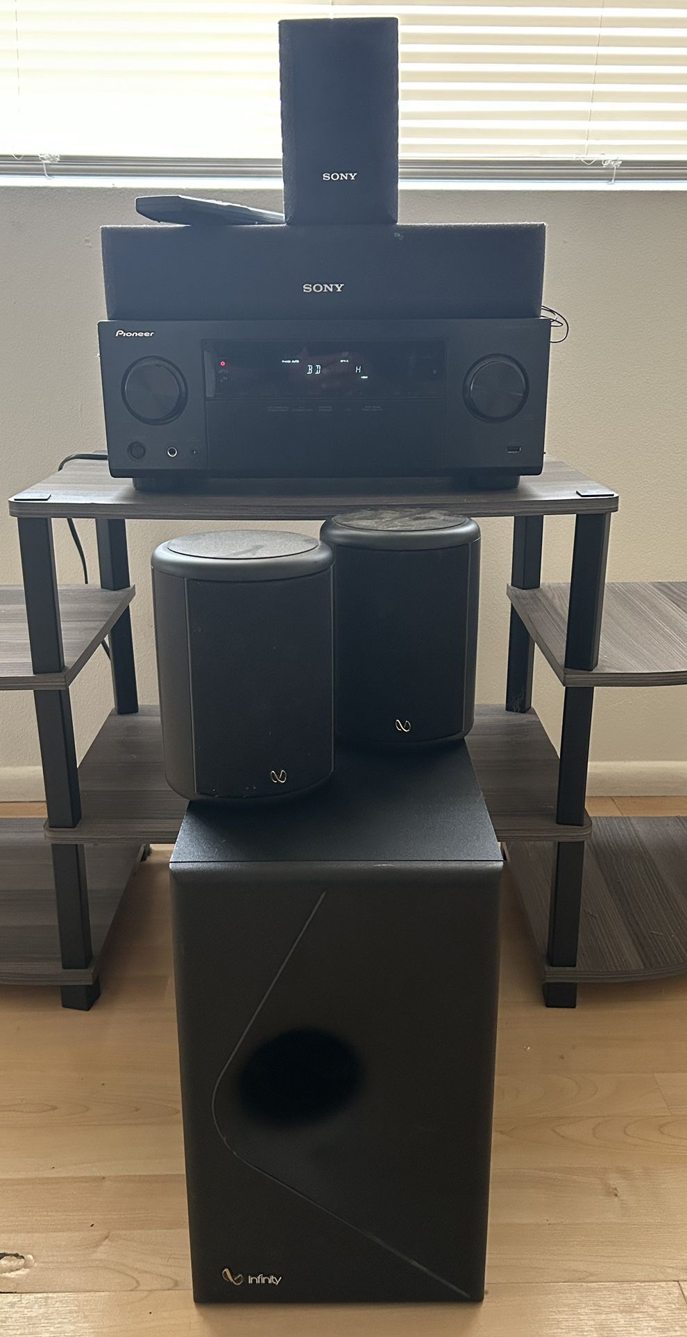 PIONEER RECEIVER, SONY MONITOR WITH SOUNDBAR, TWO INFINITY MONITORS WITH SUBWOOFER