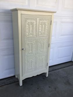 Cabinet with Embossed Door Panel