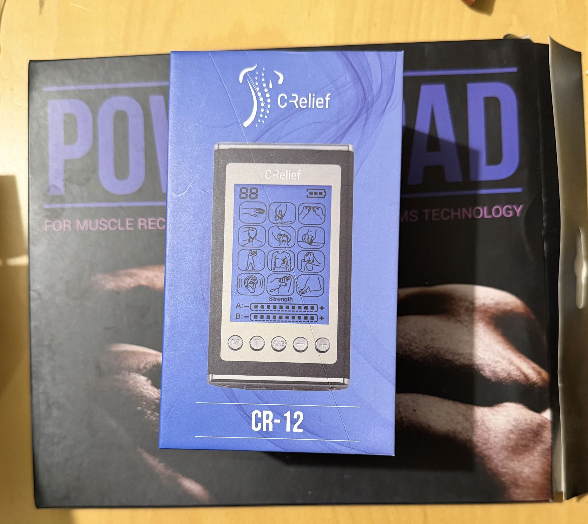 C Relief C-12 EMS machine with power pad attachment