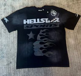 Hellstar Sports black t-shirt with white graphic of a face with flames and a star #hellstar #flames