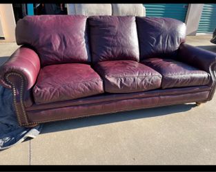 Burgundy leather nailhead trim sofa