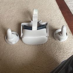 used newish oculus with controllers and charger