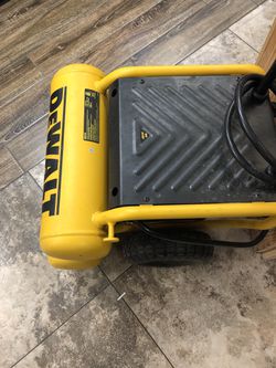 Dewalt 1.1 HP CONTINUOUS 4 GALLON ELECTRIC WHEELED DOLLY-STYLE AIR COMPRESSOR WITH PANEL
