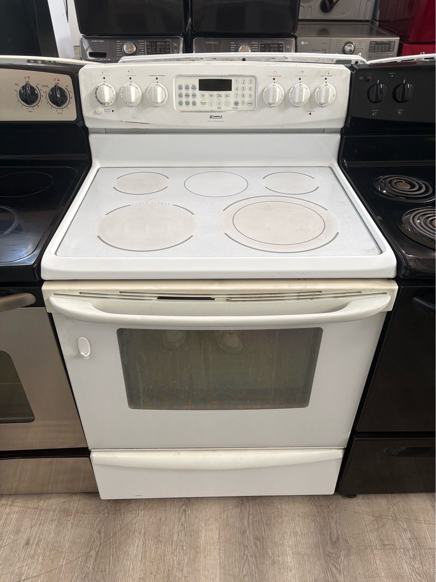 All white Kenmore electric stove