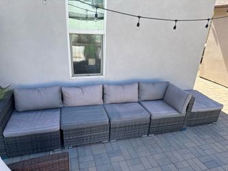 Outdoor sectional sofa with ottoman