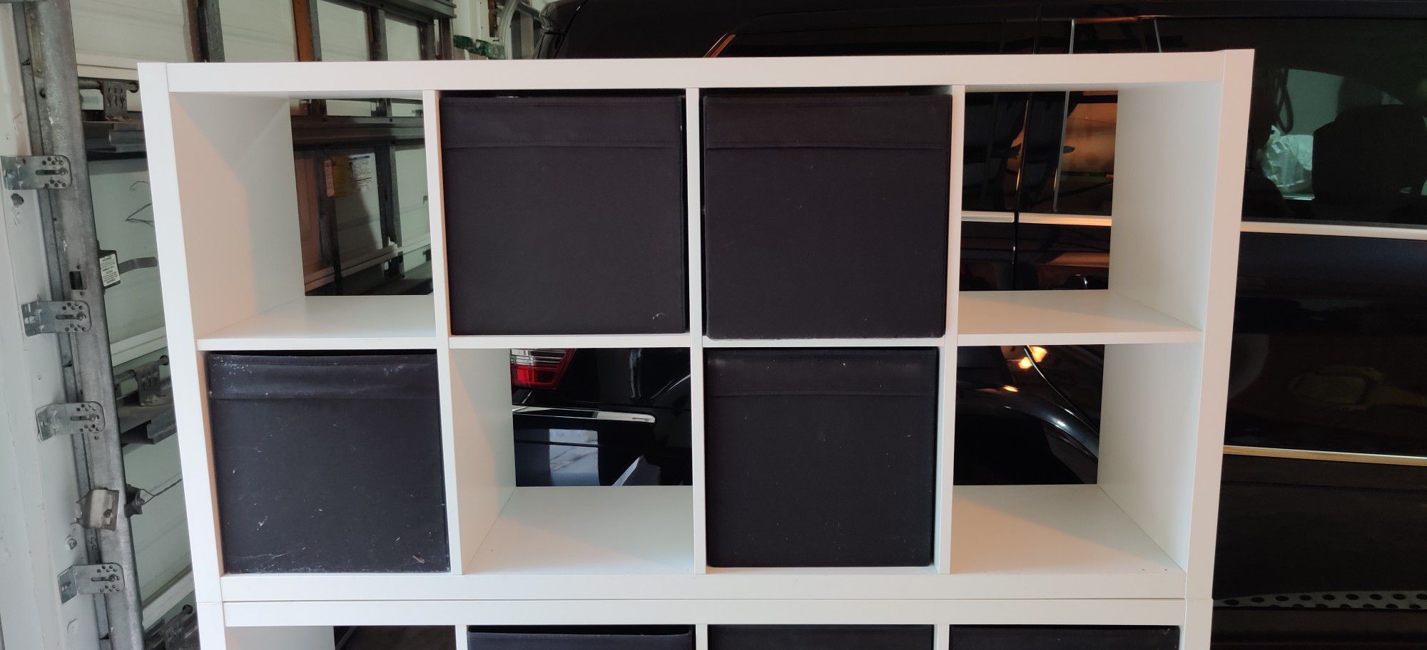 Ikea shelf unit with drawer.