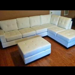 White leather sectional sofa with storage ottoman