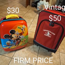 DISNEY TRAVEL SUITCASE.  THE RED ONE IS A GREAT CONDITION VINTAGE ITEM. 1955..  FIRM PRICE 