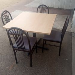 TABLE AND FOUR CHAIRS 