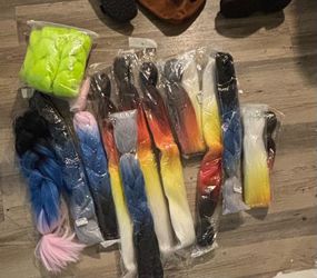 14 bundles of 24 inch BRAIDING HAIR. NEVER USED BEFORE IN PACKAGING