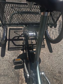This vehicle is a Torker Tristar adult tricycle (specifically the Tristar 3-Speed or Tristar Hybrid model in metallic mint green