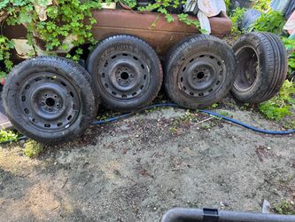 225/60 R16 set of 4 tires with rim.