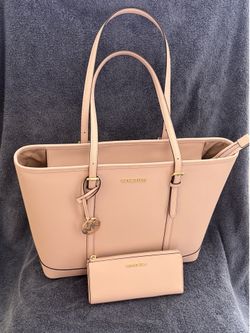 Michael Kors pink tote and matching wallet