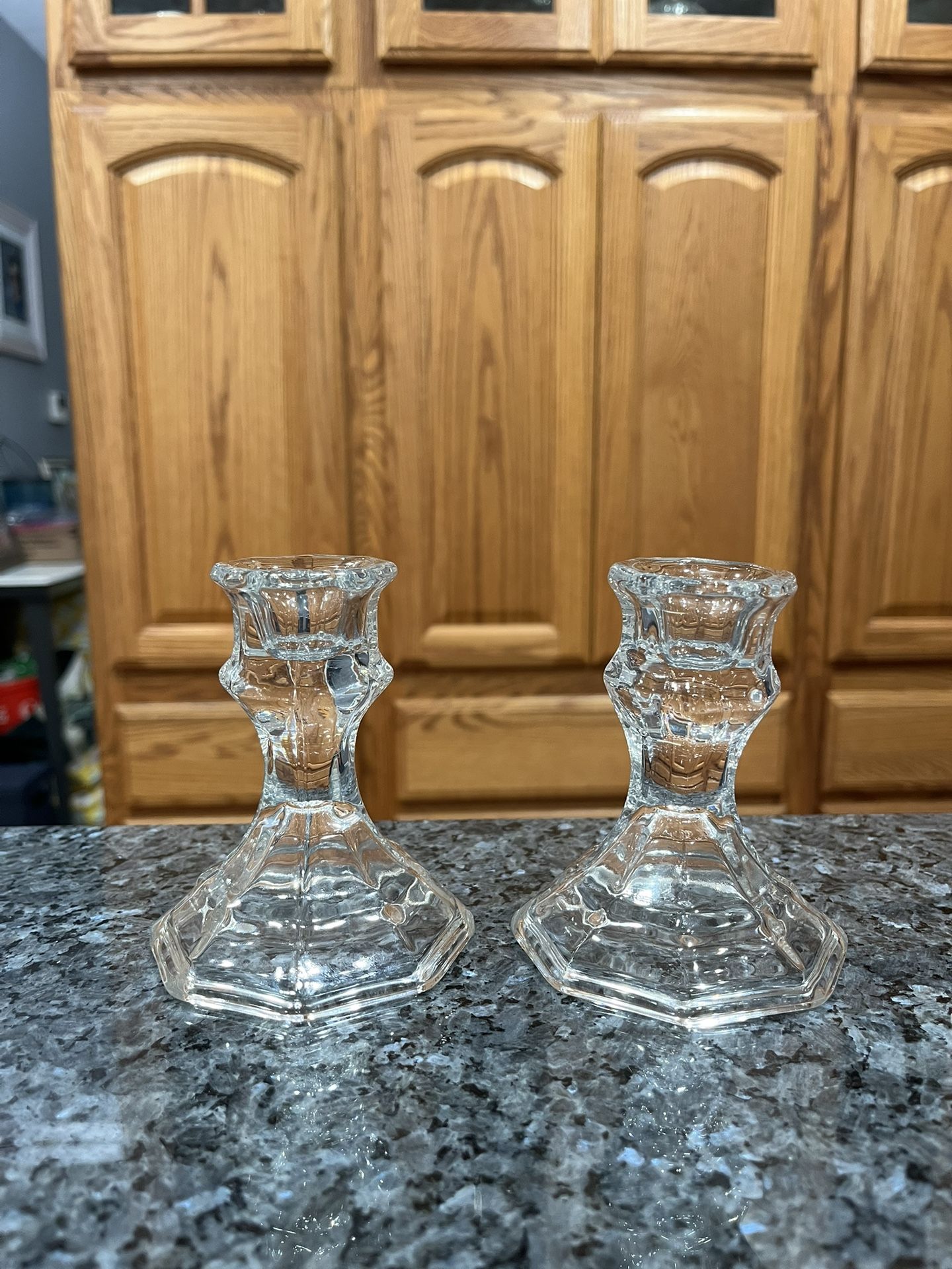 Set of 2 Glass Decorative Candlestick Holders. Size approximately 4 inches tall. Brand new never used.