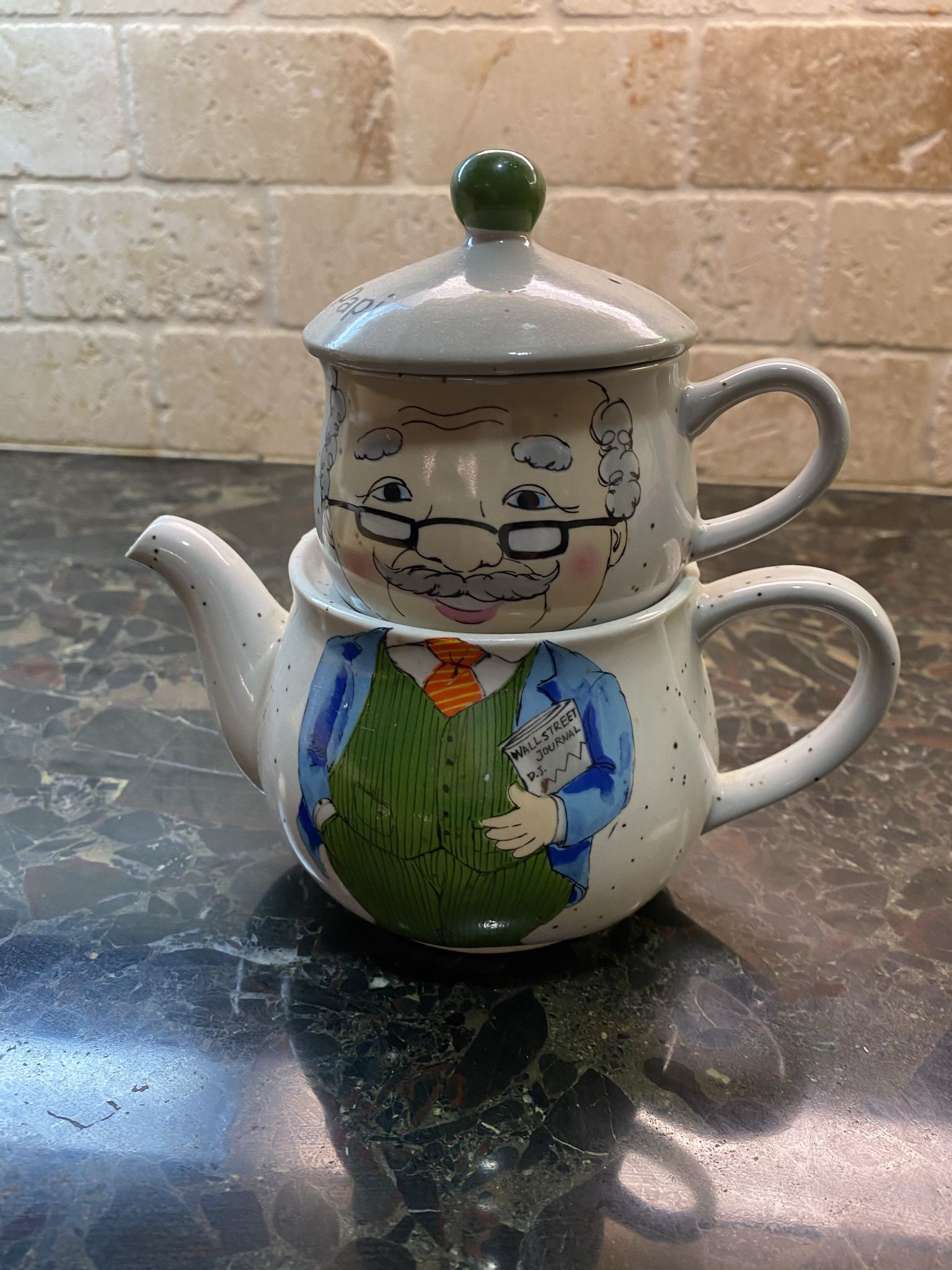 Tea pot and a tea cup