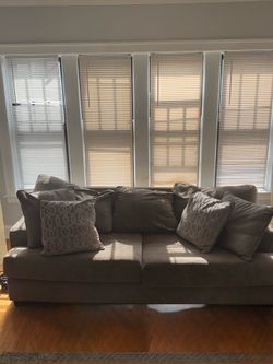 Gray sofa with pillows
