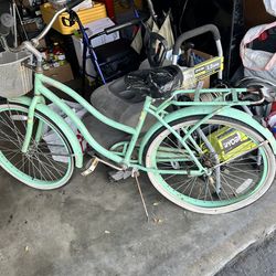 Huffy green beach cruiser bicycle