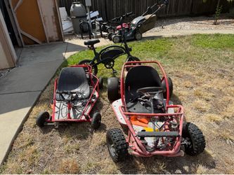 Two electric golf karts and electric bike