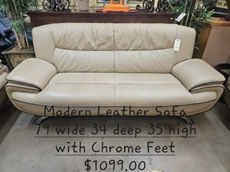 Sofa Leather w Chrome feet modern We are located at 2811 East Bell road. Another Time Around Furniture.