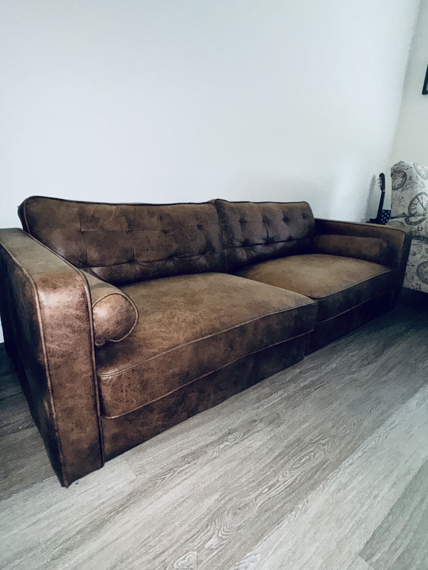 Light Brown Faux Leather Couch.