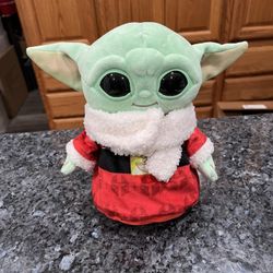 Star Wars Mandalorian Grogu The Child  Plush Christmas Baby Yoda.  Size approximately 8 inches tall.  Brand new no tag.  Has been on display in a cabi