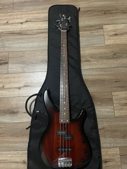 yamaha bass guitar with gator case