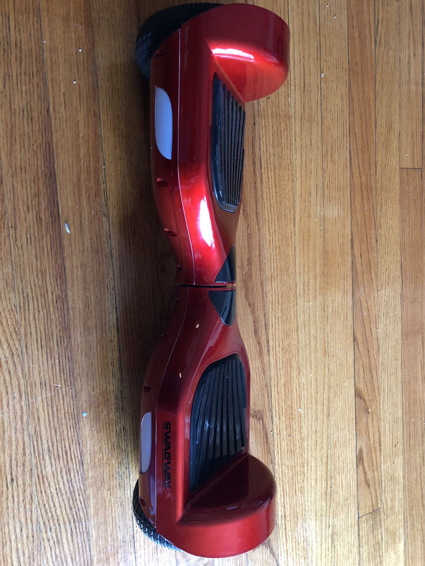 Red “Swagway” hoverboard, used but in great condition