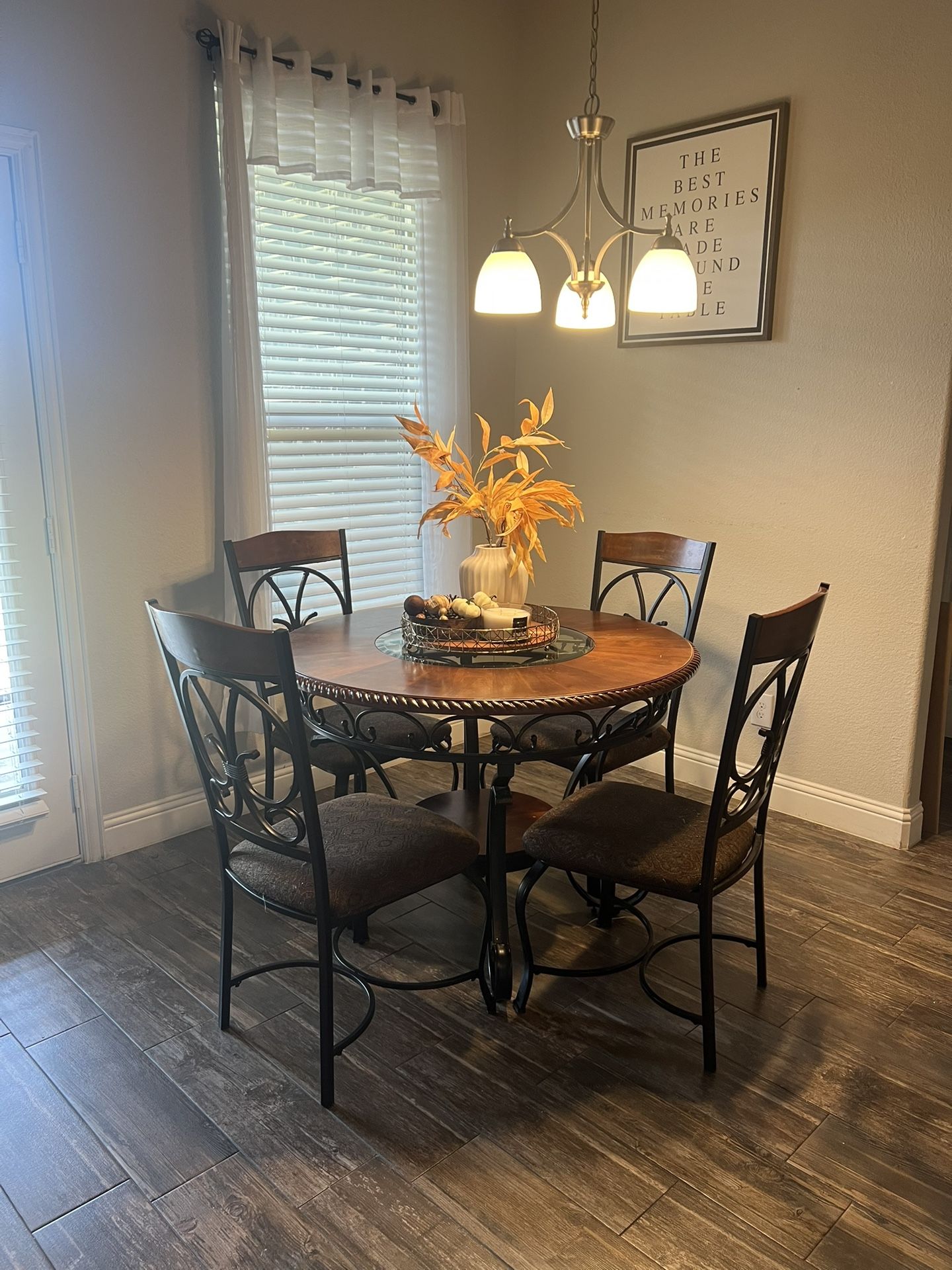 Breakfast table with 4 chairs for sale.
