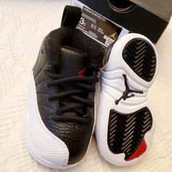 Jordan 12 Retro (Toddler 3c). Color: Black / Varsity Red - White.