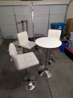 3 bar stools with table
