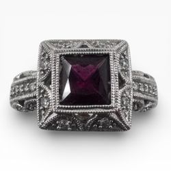 14K White Gold Ring with Garnet and Diamonds. (Size 7.75)