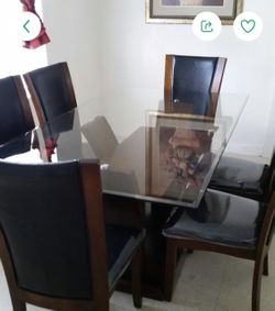 Glass top dining table