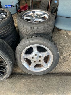 Mid 90’s mustang wheels and tires.