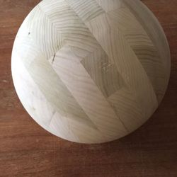 Large 10” solid wooden ball.