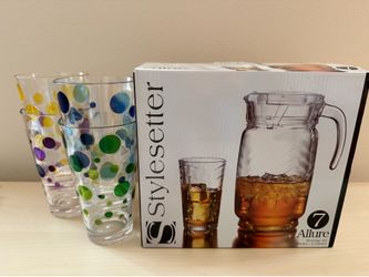 New in box 7 piece beverage pitcher and glass set and 4?big beverage cups