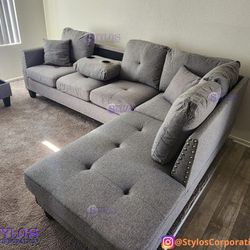 New Sectional And Ottoman W/ Storage (Two Pillows Included) Grey And Charcoal Fabric)