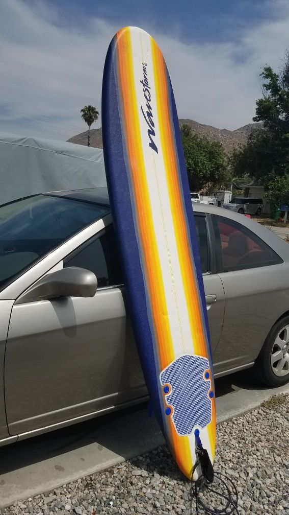 8 foot foam wavestorm surfboard with fans and Ankle leash