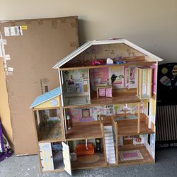 triple story dollhouse with furniture 